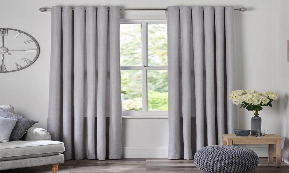 How can I enhance the insulation of my room properties by using eyelet curtains?